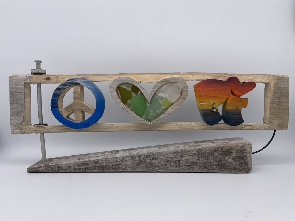 Folk art wall sculpture